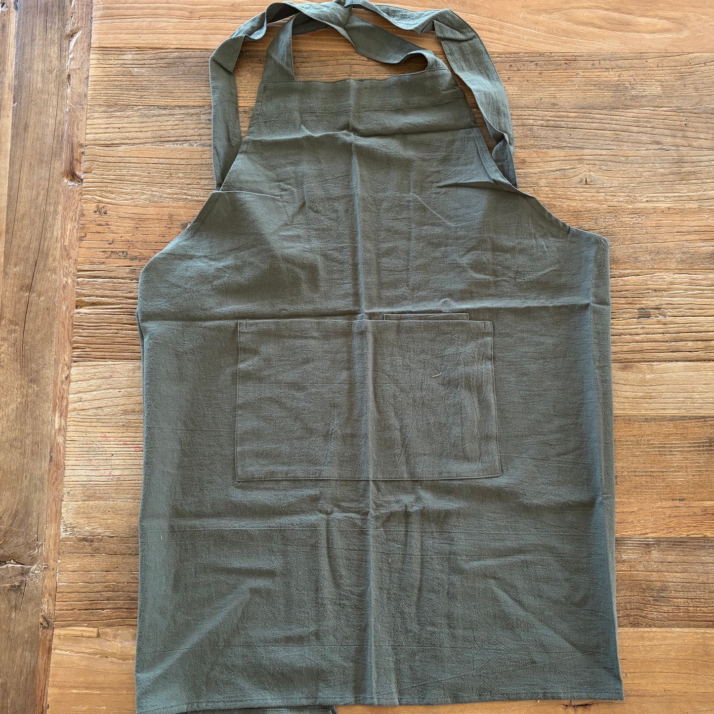 Green apron for when working with clay 