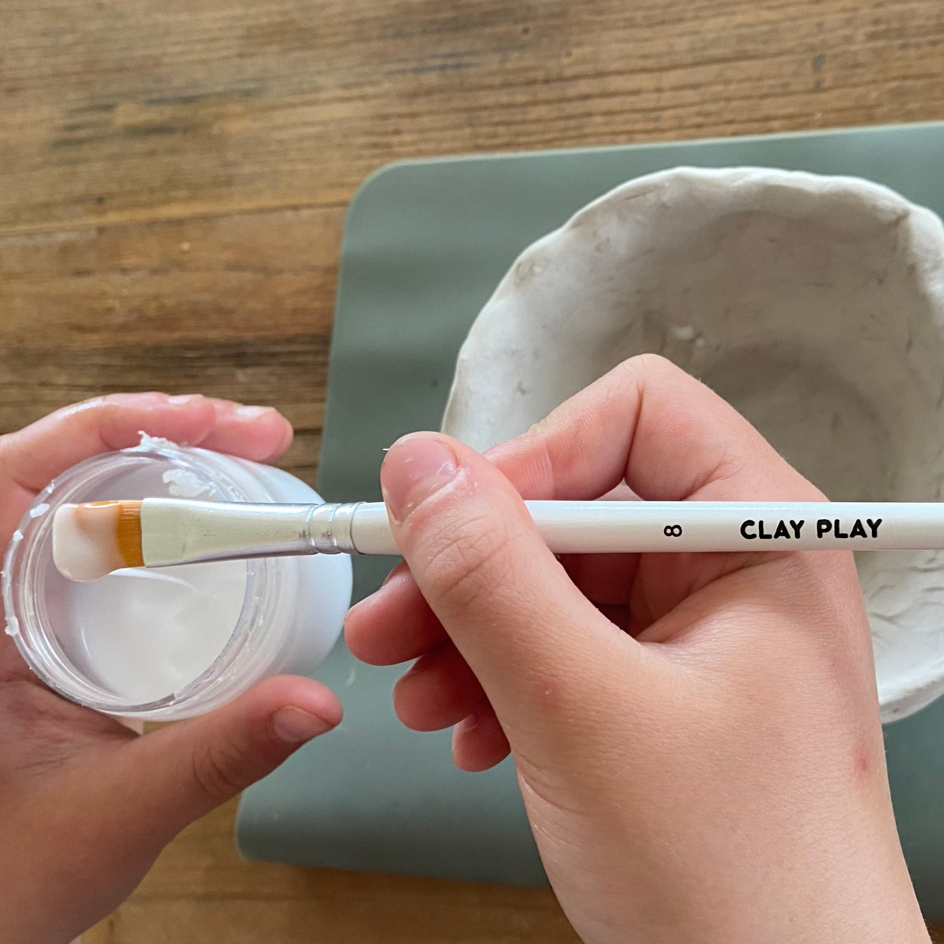 image of clay bowl being sealed with clay play sealant.